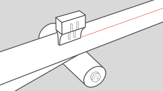 A microbond system cutting a nonwoven fabric 